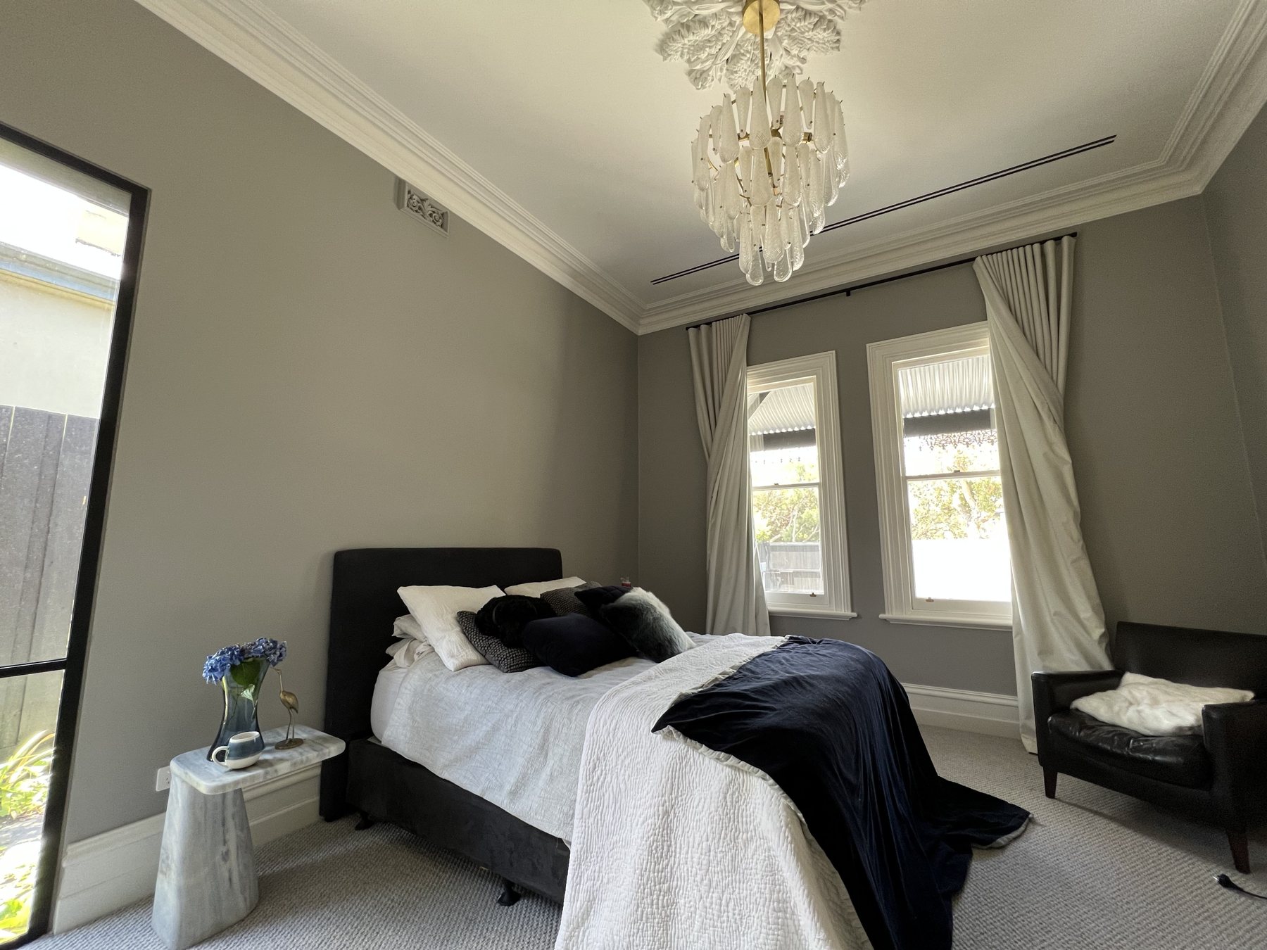 Ducted air-conditioning outlet in a finished bedroom