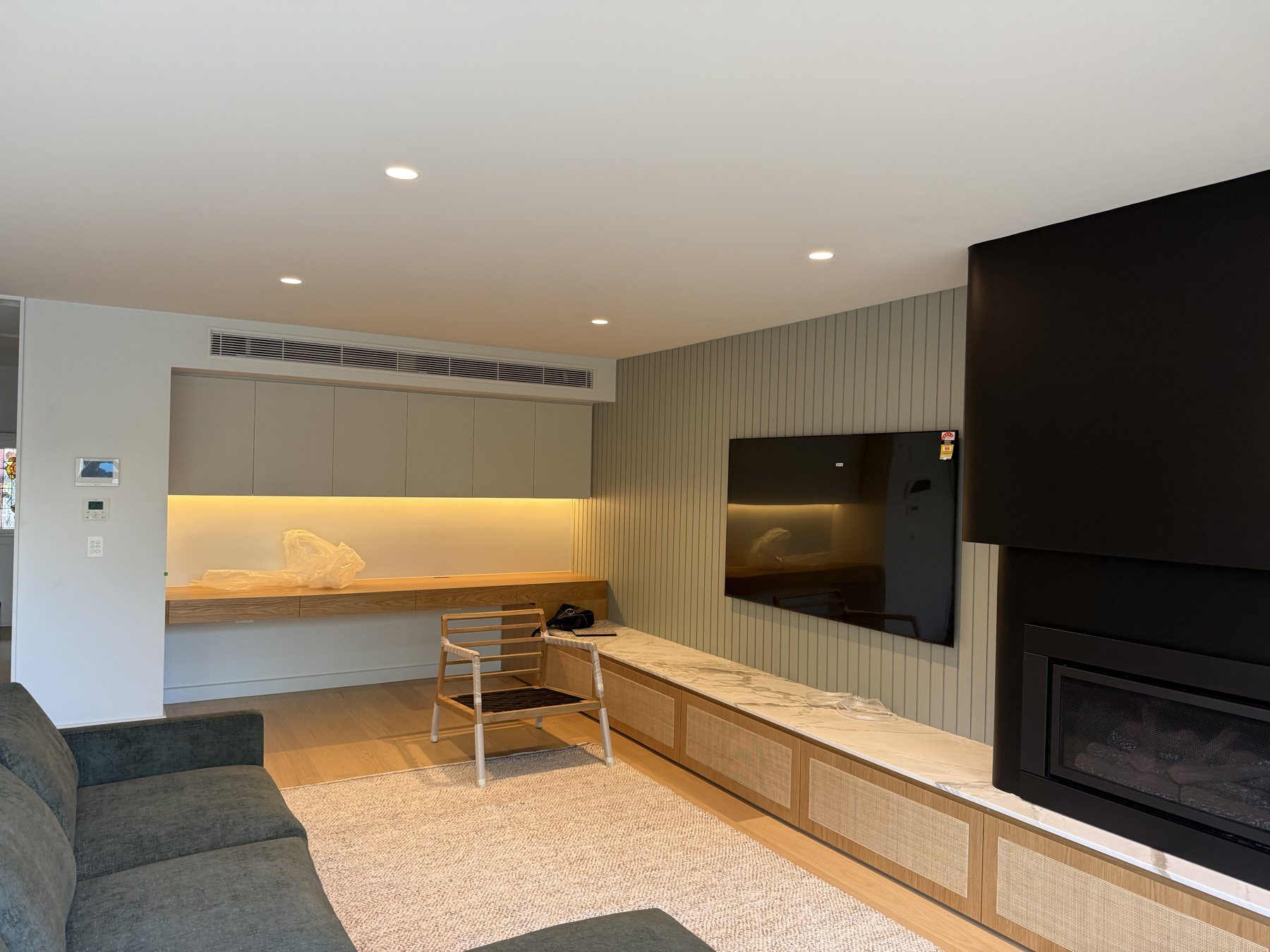 Ducted outlet above a kitchen and living zone
