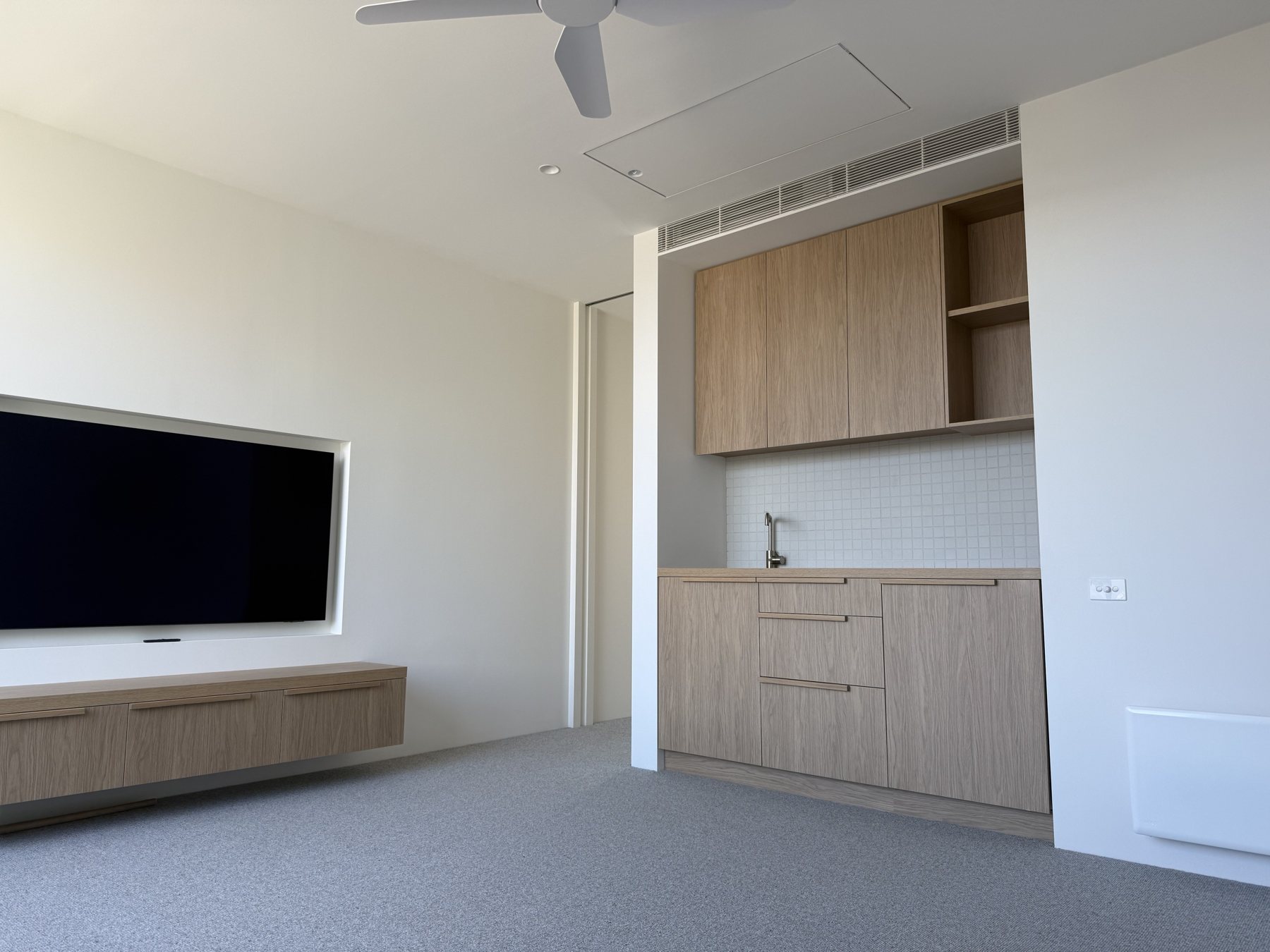 Ducted outlet in a finished lounge room